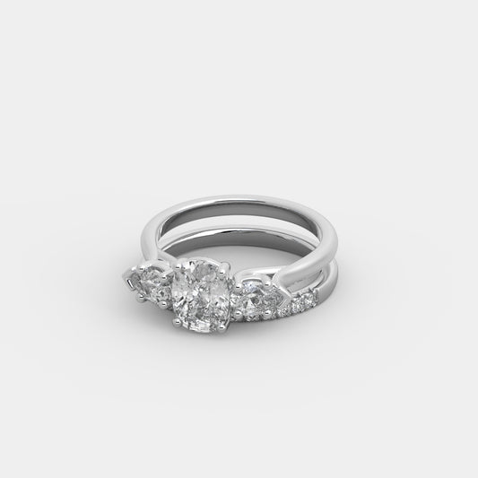 Lyra Pear-Shouldered x French-Pavé Set in Cushion Cut