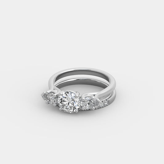 Lyra Pear-Shouldered x French-Pavé Set in Round Cut